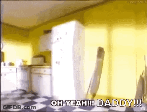 A Kitchen With A White Refrigerator And A Checkered Floor And The Words Oh Yeah Daddy . GIF