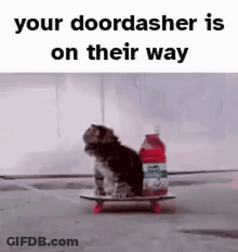 A Kitten Is Riding A Skateboard With A Bottle Of Soda On It . GIF
