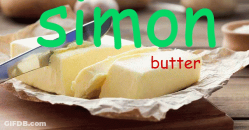 A Knife Is Cutting A Piece Of Butter That Says Simon Butter On It GIF