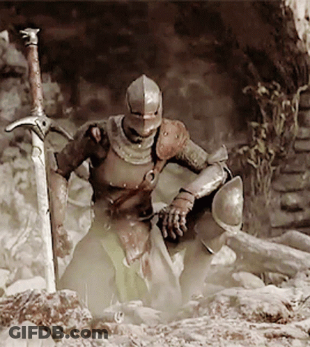 A Knight In Armor Holds A Large Sword In His Hand GIF