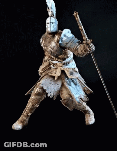 A Knight In Armor Is Holding A Long Sword GIF