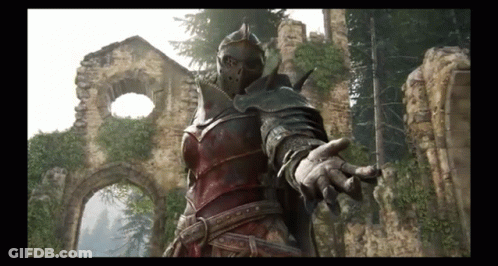 A Knight In Armor Is Standing In Front Of A Ruined Building With His Hand Out . GIF