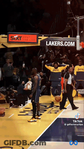 A Lakers Basketball Player Stands On The Court GIF