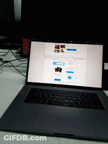 A Laptop Computer Is Open To A Page That Says ' A Few Pictures ' GIF