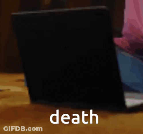 A Laptop Is Sitting On A Table With The Word Death Written On The Bottom GIF
