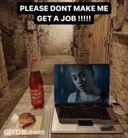 A Laptop Sits On A Table Next To A Bottle Of Fanta Soda GIF