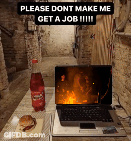 A Laptop Sits On A Table Next To A Coca Cola Bottle And A Hamburger GIF