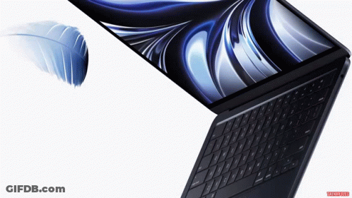 A Laptop With A Feather On The Screen And A White Background GIF