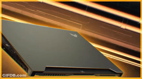 A Laptop With The Letter X On The Back GIF
