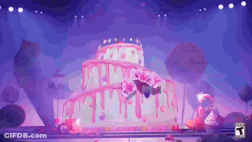 A Large Birthday Cake With Pink Frosting Is On A Stage In A Purple Room . GIF