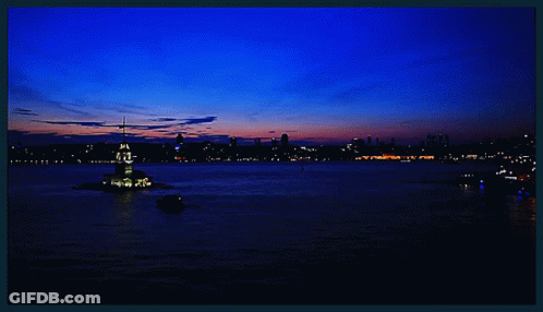 A Large Body Of Water With A Tower In The Middle Of It GIF