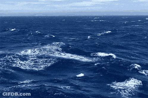 A Large Body Of Water With Waves And Foam Coming Out Of It GIF