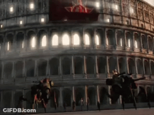 A Large Building With A Red Banner That Says ' Yy ' On It GIF