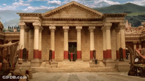 A Large Building With Columns And A Sign That Says ' Temple ' GIF