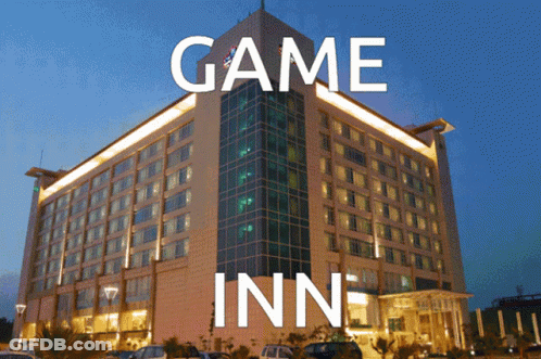 A Large Building With Game Inn Written On It GIF