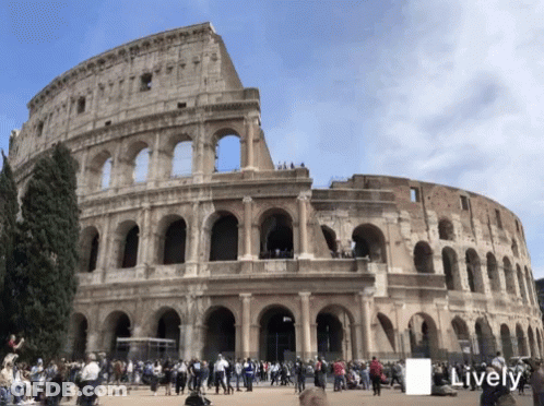 A Large Building With The Word Lively On The Bottom Left GIF