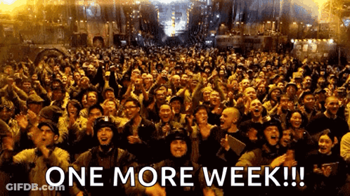 A Large Crowd Of People With The Words One More Week In The Corner GIF