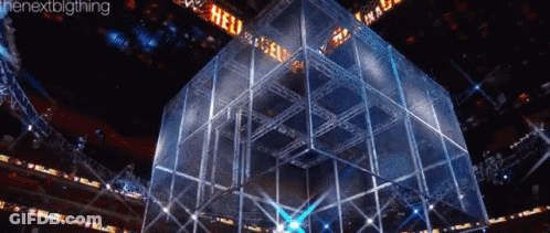 A Large Cube In A Stadium With The Word Hell On It GIF