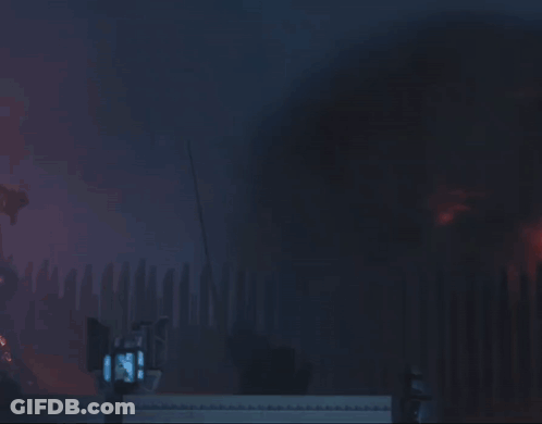 A Large Explosion Is Taking Place In A Dark Room With A Sign That Says ' A ' On It GIF