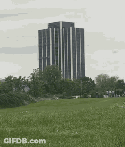 A Large Explosion Is Taking Place In The Middle Of A Field GIF