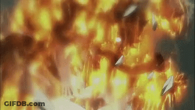 A Large Explosion With A Lot Of Flames Coming Out Of It GIF