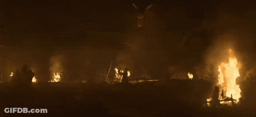 A Large Fire Is Burning In The Dark GIF