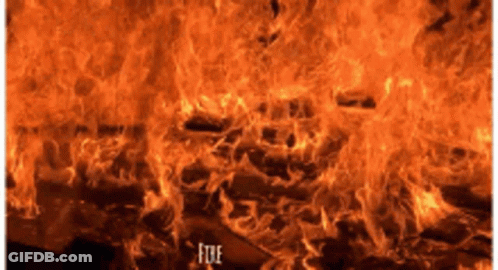 A Large Fire With The Word Fire Written On The Bottom GIF