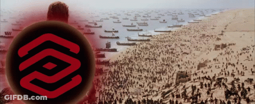 A Large Group Of People Are Gathered On A Beach With A Large Red Circle In The Middle GIF