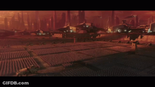 A Large Group Of Soldiers Are Standing In A Field GIF