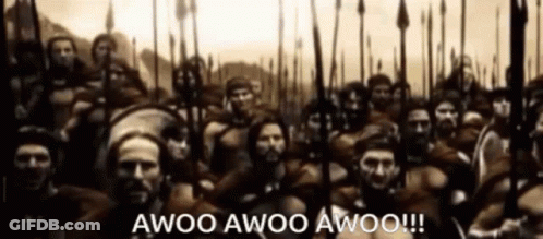 Soldiers Standing In Line With Spears And Shields GIF