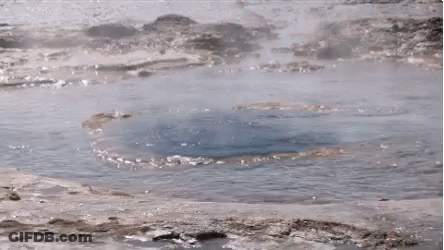A Large Hole In The Middle Of A Body Of Water . GIF
