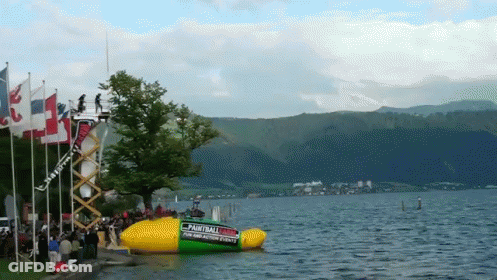 A Large Inflatable Boat With The Word Paintball On The Side Of It GIF