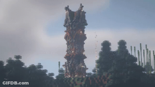 A Large Minecraft Tower Is Surrounded By Trees And A Cloudy Sky GIF