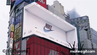 Large Nike Sign On Building GIF