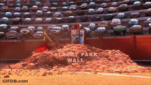 A Large Pile Of Dirt With The Words Albert Park Wall On It GIF
