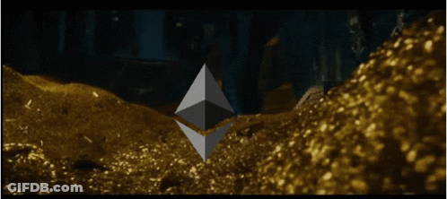 A Large Pile Of Gold Is Being Poured Into A Dark Room GIF