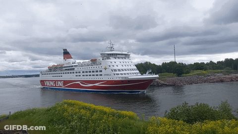 A Large Red And White Viking Line Cruise Ship GIF