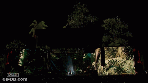 A Large Screen At A Concert Says Gazelle On The Bottom GIF