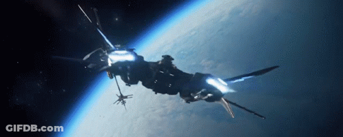 A Large Space Ship Is Flying Over The Earth In Space GIF