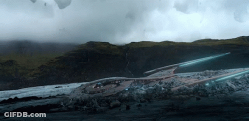 A Large Space Ship Is Sitting On Top Of A Mountain GIF