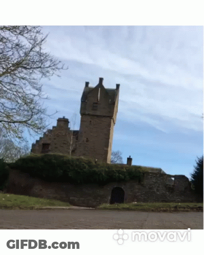 A Large Stone Building With A Blue Sky In The Background And The Word Movavi On The Bottom GIF