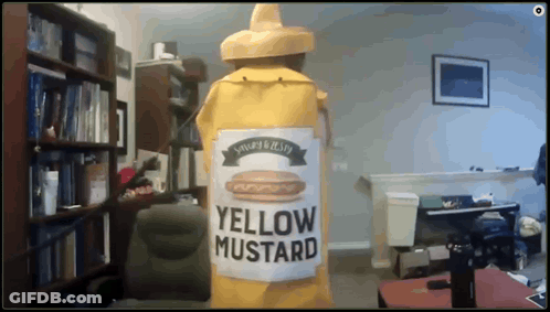 A Large Yellow Bottle Of Yellow Mustard In A Room GIF