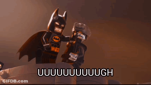 A Lego Batman Is Standing Next To Another Lego Batman And The Words Uuuuuuuugh Are Above Them GIF