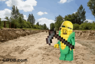 Lego Character In Corn Costume Holding Axe GIF
