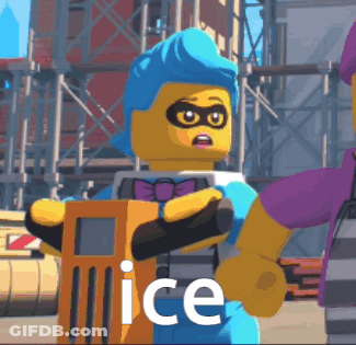A Lego Character With Blue Hair Is Holding An Orange Object And The Word Ice Is On The Bottom GIF