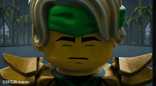 A Lego Character With Green Eyes And A Green Hat With The Word Ninja On It GIF