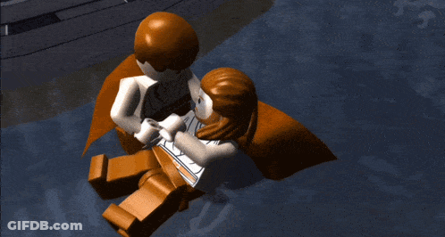 A Lego Figure Is Laying On The Ground With A Cross On His Head GIF