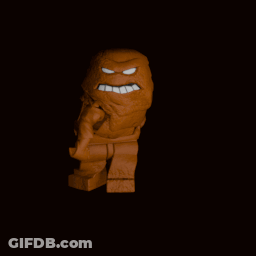A Lego Figure Of A Cartoon Character With A Beard And Big Teeth GIF
