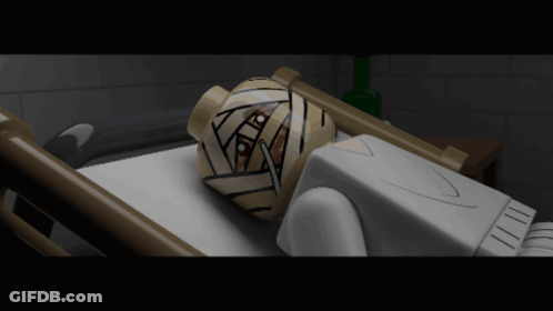A Lego Figure With A Bandage On His Head Is Laying In A Hospital Bed GIF