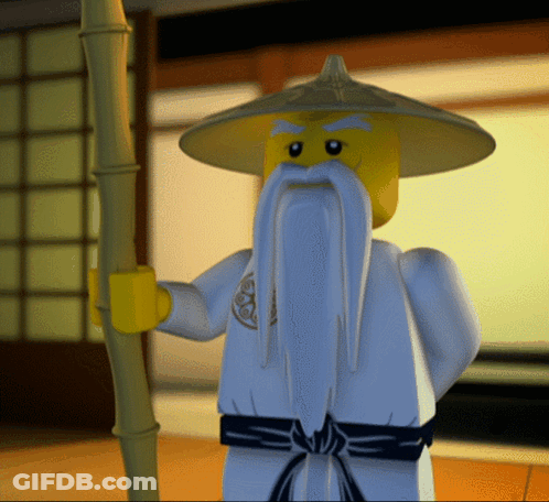 A Lego Figure With A Long Beard And A Yellow Hat GIF
